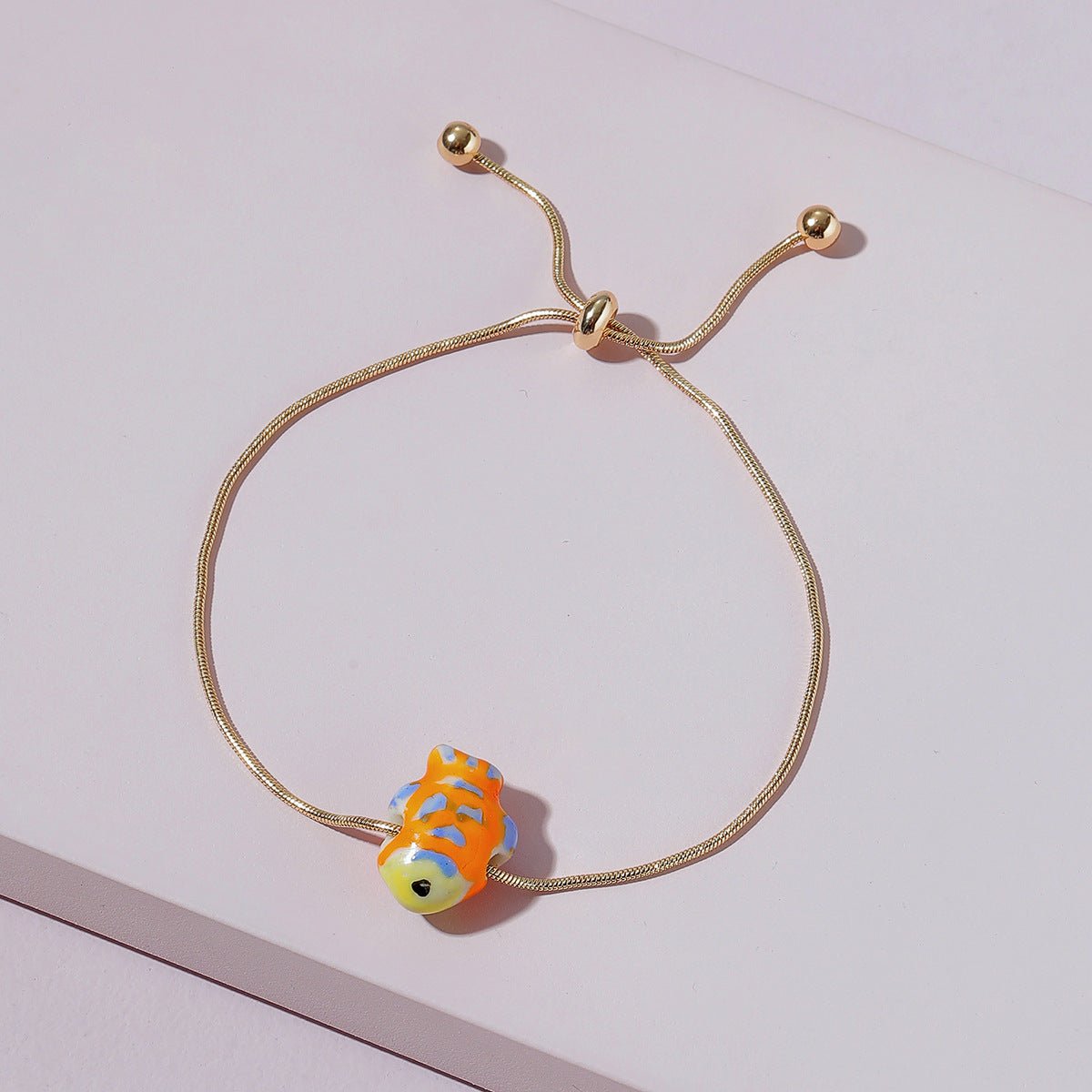 Minimalist Geometric Metal Bracelet – Elegant & Modern Alloy Design Fashion Jewelry Ceramic Fish Snake Chain Drawstring Bracelet - Metamorphosis Creations