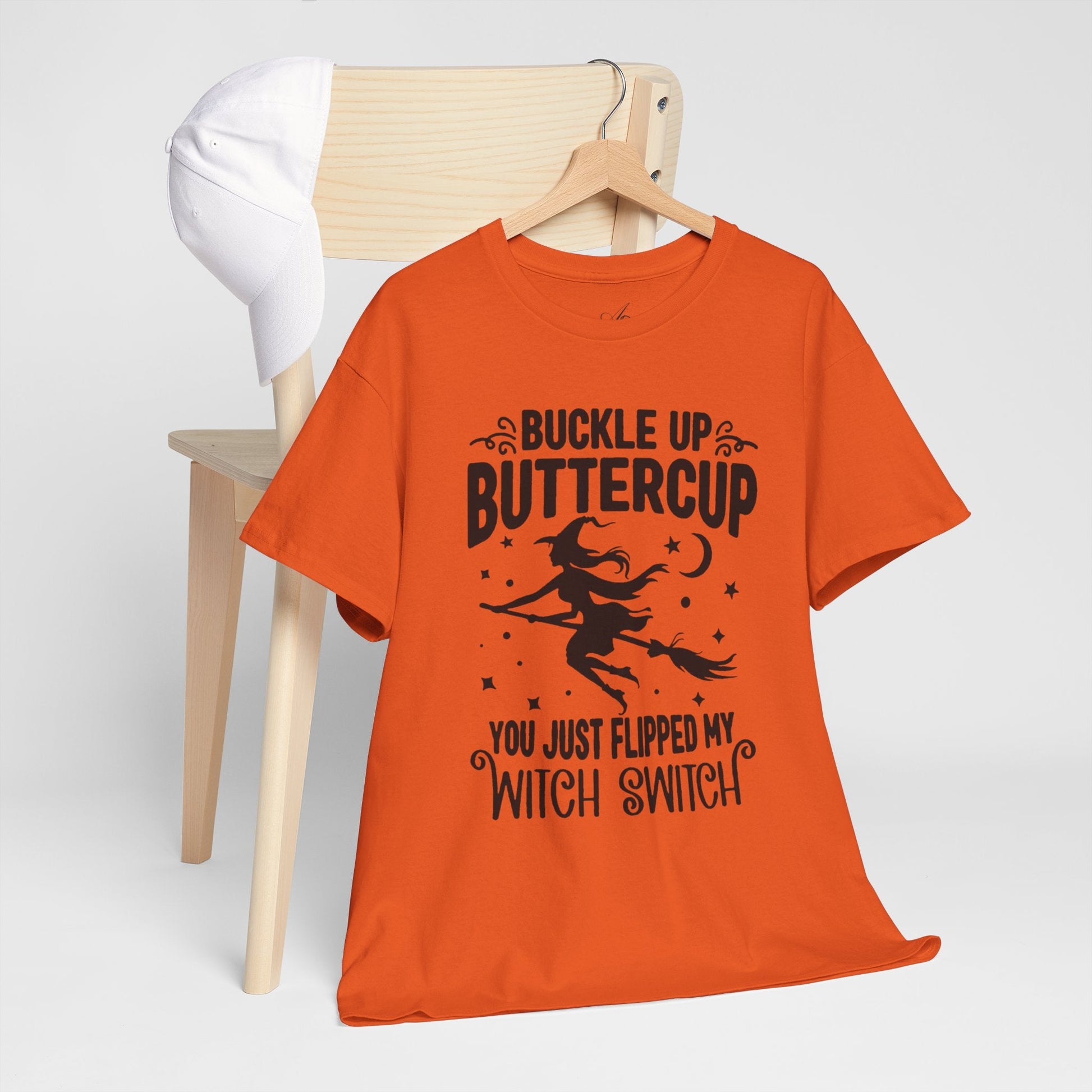 Witchy Humor Tee - Buckle Up Buttercup, Unisex Heavy Cotton Tee, Halloween Shirt, Casual Wear, Gift for Her, Funny T-Shirt - Metamorphosis Creations